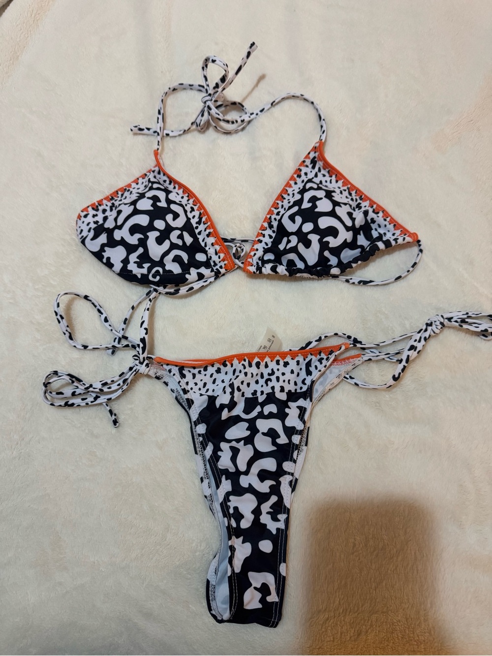 Black & White Patterned One-Piece Swim Set with Orange Trim